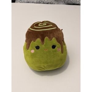 The Squishmallows Malta the Matcha Cinnamon Roll 8-Inch Plush is an 8-inch plush